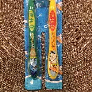 Peanuts | Bath, Skin & Hair | Peanuts Snoopy Surfing Toothbrush Set ...